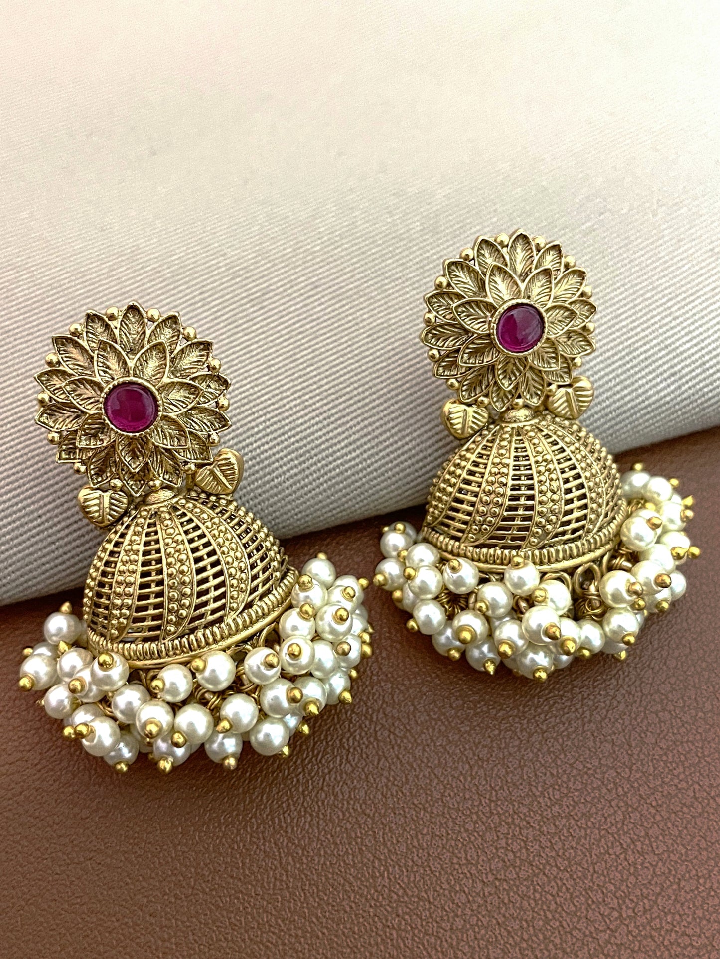 Shrunjna Pearl Gold Finish Jhumki Earrings