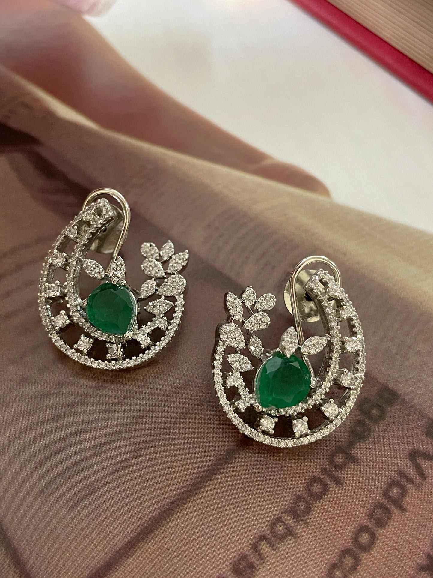 Prema Emerald Zircon Swirl Earrings